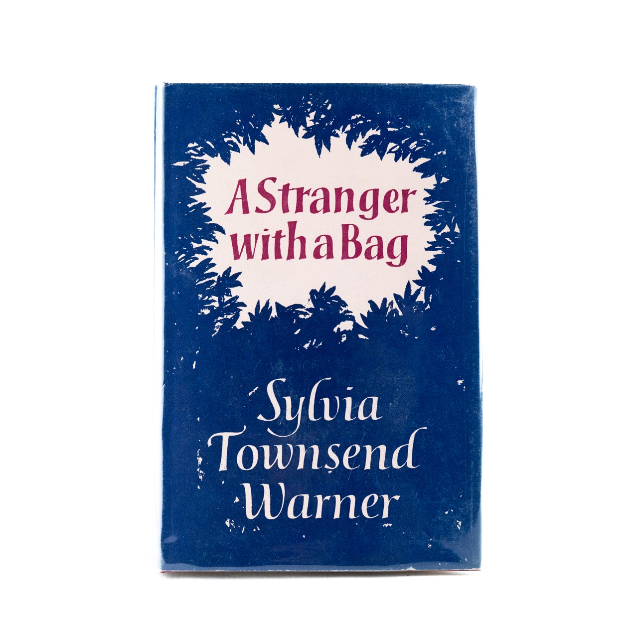 Portada 1:1 — A Stranger with a Bag